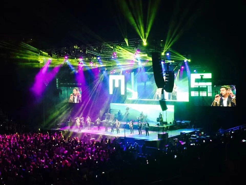 a live show events with thousands of people and surrounded with light sound and led mesh screen