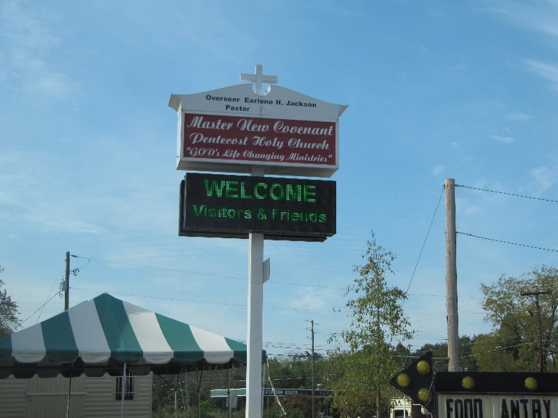 a church with led signs showed welcome on it.