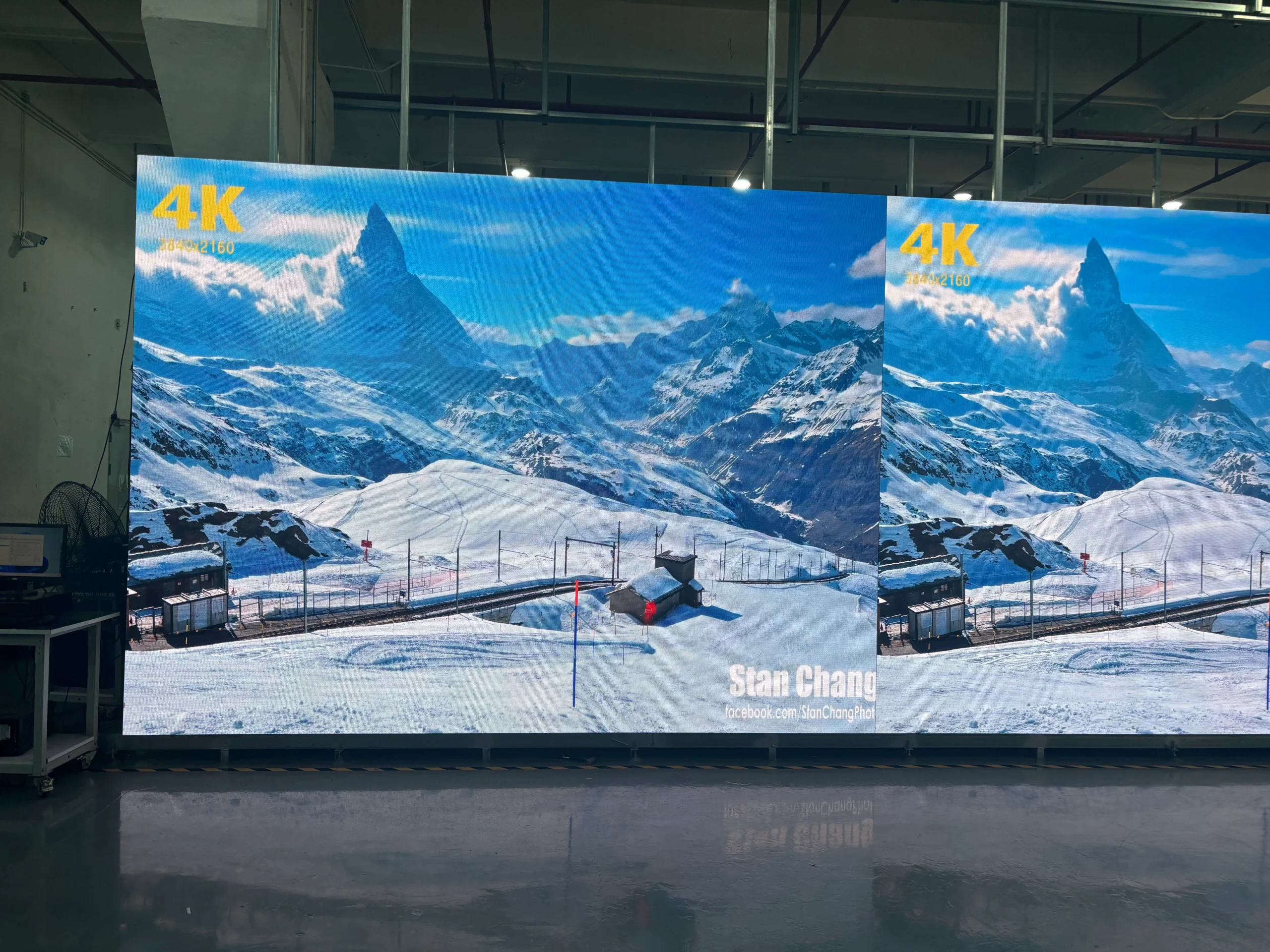 video wall with snow mountain on it