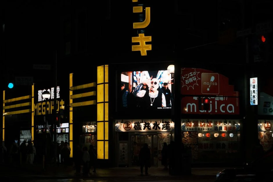 Neon-lit street scene at night in Sapporo, Japan, showcasing the vibrant city nightlife. - 3d led billboards in china